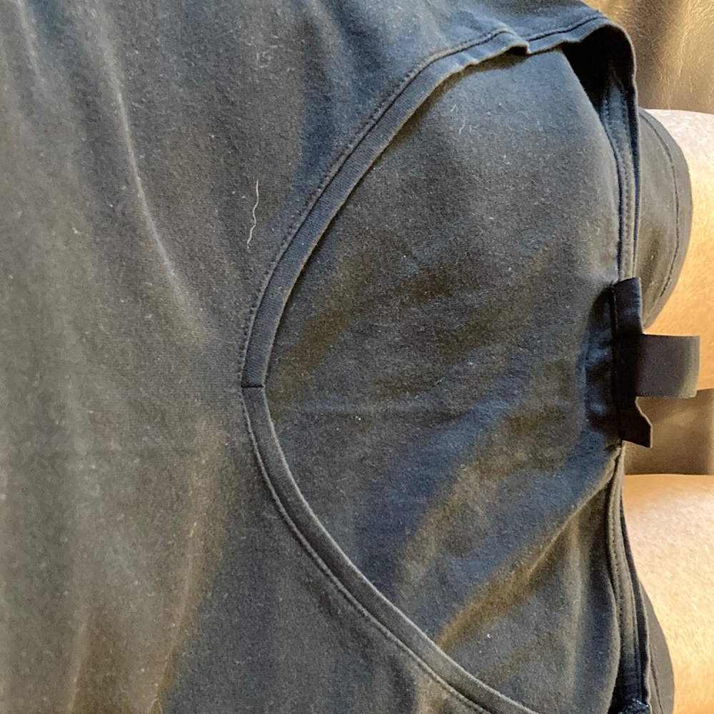 Attention. Med. Black t shirt. Soft. Good shape.